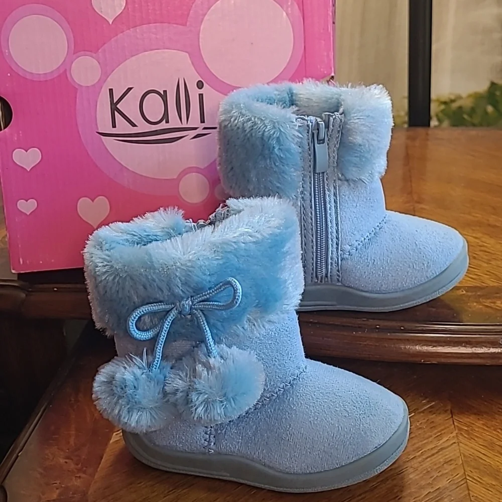 New in box! Kali Girls size 5 baby sky blue boots with pom pom tassels